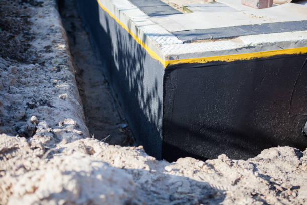 Professional Basement Waterproofing technician working in White Bluff, TN
